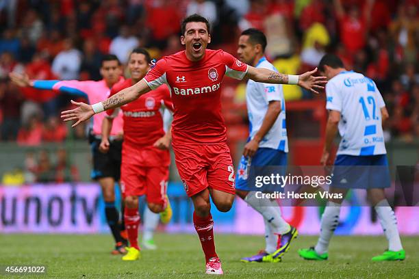 Edgar Benitez of Toluca celebrates after scoring the opening goal of his team during a match between Toluca and Puebla as part of 12th round Apertura...