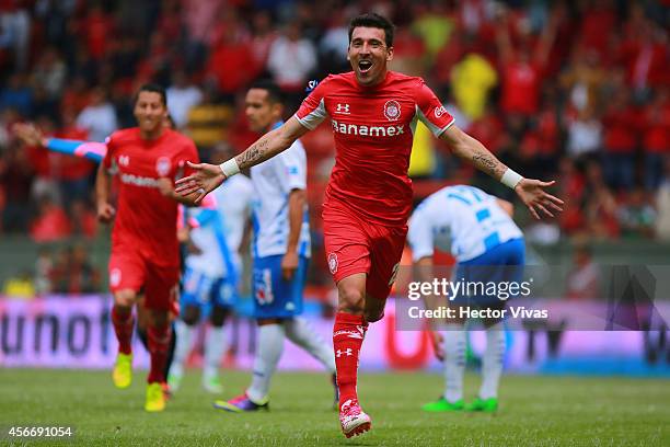 Edgar Benitez of Toluca celebrates after scoring the opening goal of his team during a match between Toluca and Puebla as part of 12th round Apertura...