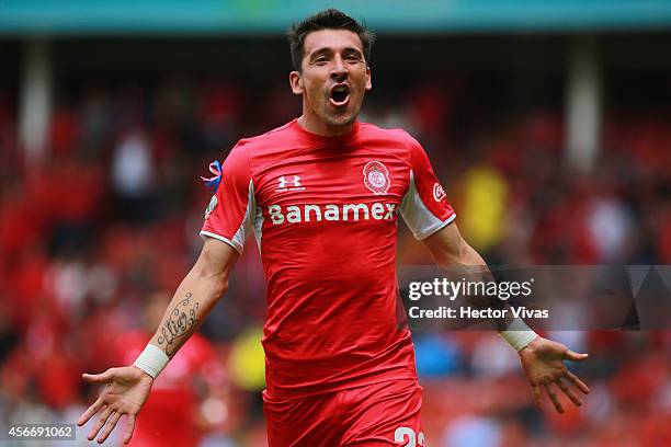 Edgar Benitez of Toluca celebrates after scoring the opening goal of his team during a match between Toluca and Puebla as part of 12th round Apertura...