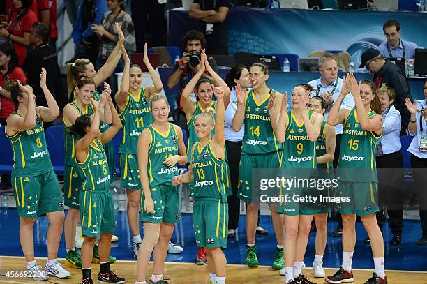 Australia's players celebrate their win agaist Turkey in the 2014 FIBA Women's World Championships 3rd place basketball match at Fenerbahce Ulker...