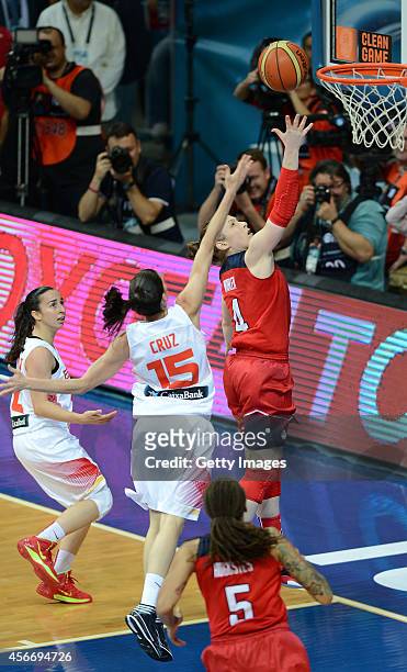 S Lindsay Whalen is in action with Sancho Lyttle of Spain during the 2014 FIBA Women's World Championships final basketball match between Spain and...