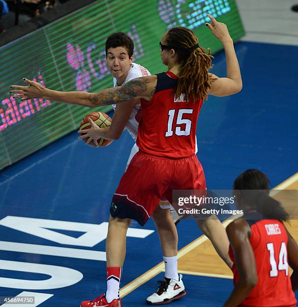 Laura Nicholls of Spain is in action with USA's Brittney Griner during the 2014 FIBA Women's World Championships final basketball match between Spain...