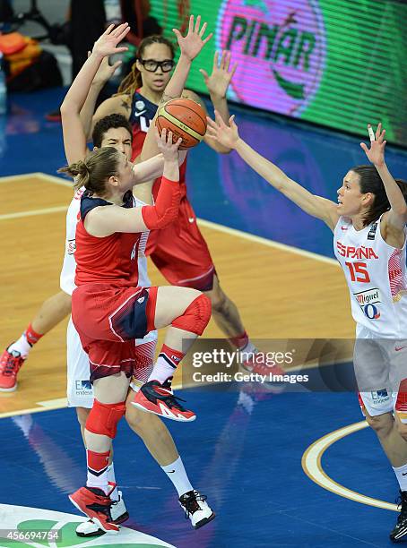 S Lindsay Whalen is in action with Sancho Lyttle of Spain during the 2014 FIBA Women's World Championships final basketball match between Spain and...