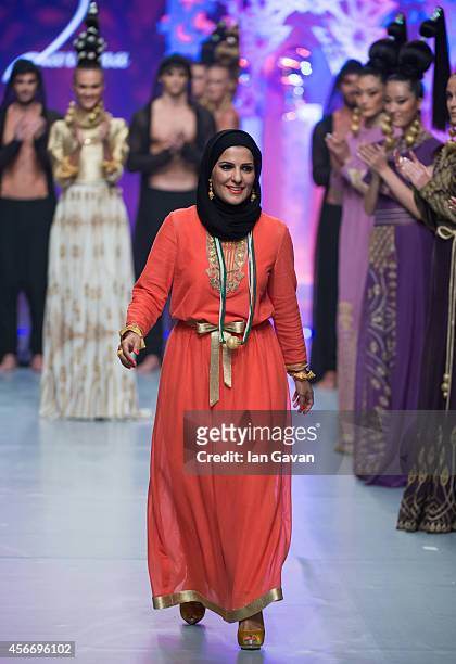 Fashion designer Zareena Yousif on the runway after the Zareena show during Fashion Forward at Madinat Jumeirah on October 5, 2014 in Dubai, United...