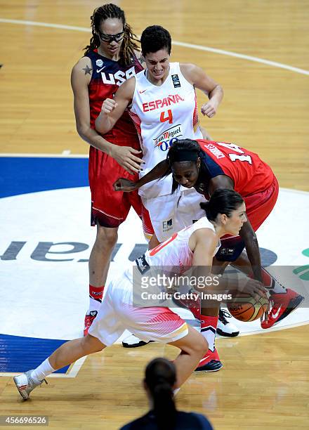 Leticia Romero of Spain rides the ball past Tina Charles of USA during the 2014 FIBA Women's World Championships final basketball match between Spain...