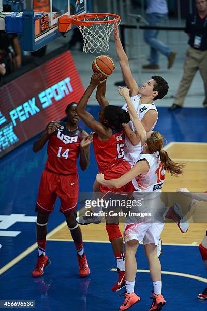 Laura Nicholls of Spain is in action with USA's Lucila Pascua during the 2014 FIBA Women's World Championships final basketball match between Spain...