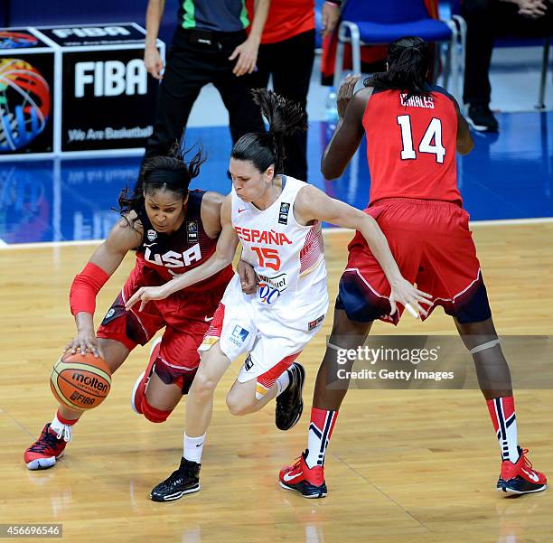 Maya Moore of USA is in action with Spain's Anna Cruz during the 2014 FIBA Women's World Championships final basketball match between Spain and USA...