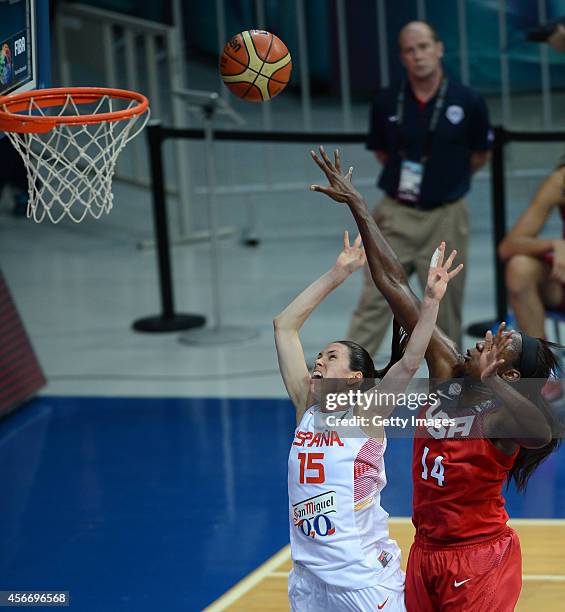 Tina Charles of USA jumps for a score over Spain's Anna Cruz during the 2014 FIBA Women's World Championships final basketball match between Spain...
