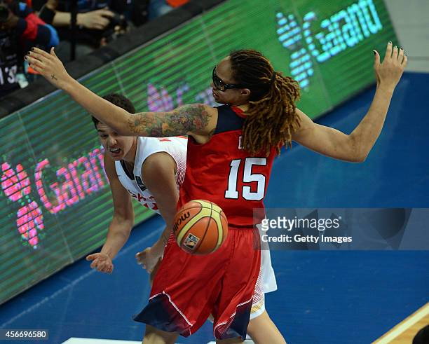 S Brittney Griner is in action with Laura Nicholls of Spain during the 2014 FIBA Women's World Championships final basketball match between Spain and...