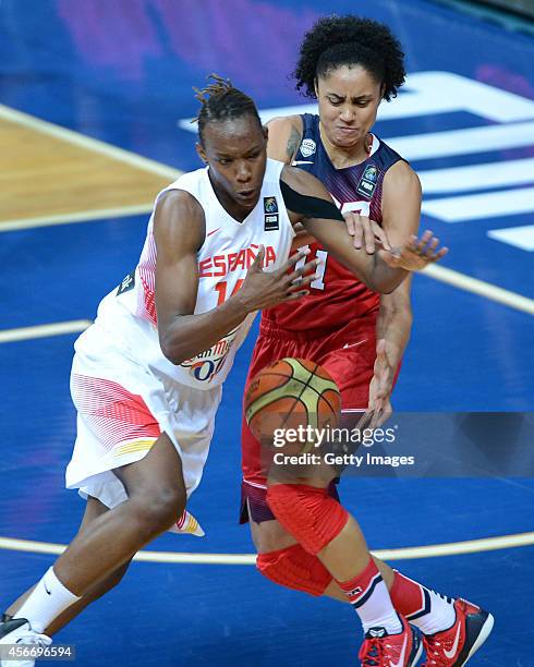 Candice Dupree of USA is in action with Spain's Sancho Lyttle during the 2014 FIBA Women's World Championships final basketball match between Spain...