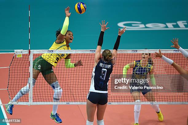 Adenizia Silva of Brazil spikes as Kristin Lynn Hildebrand of USA blocks the FIVB Women's World Championship pool F match between Brazil and USA on...