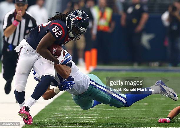 Keshawn Martin of the Houston Texans is forced out of bounds against the Dallas Cowboys in the second half at AT&T Stadium on October 5, 2014 in...