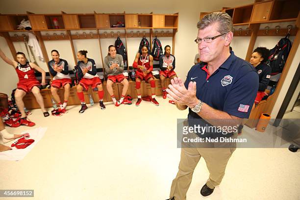 Head coach Geno Auriemma of the Women's Senior U.S. National Team speaks to the team in the locker room after defeating Spain during the finals of...