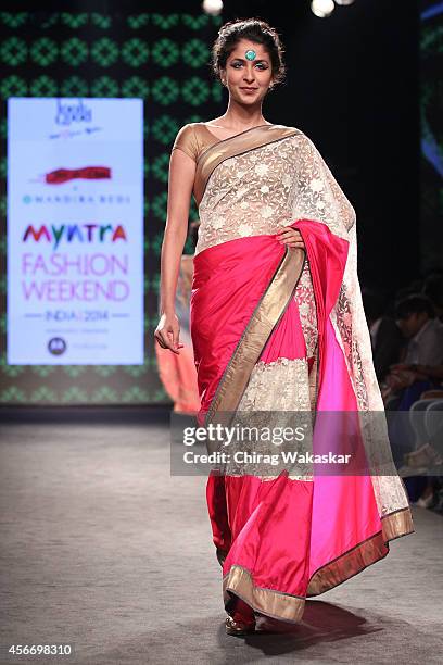 Model showcases designs by Mandira Bedi during day 3 of Myntra Fashion Weekend 2014 at The Palladium Hotel on October 5, 2014 in Mumbai, India