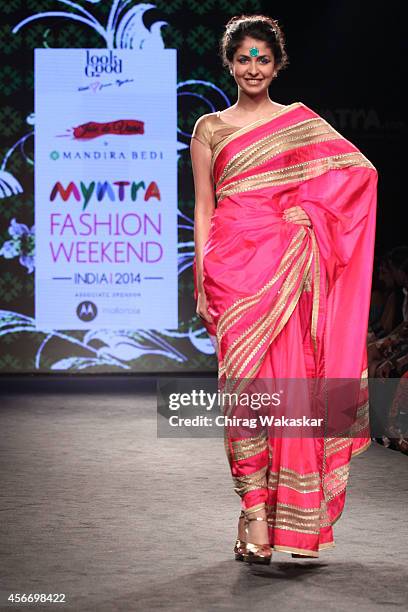 Model showcases designs by Mandira Bedi during day 3 of Myntra Fashion Weekend 2014 at The Palladium Hotel on October 5, 2014 in Mumbai, India