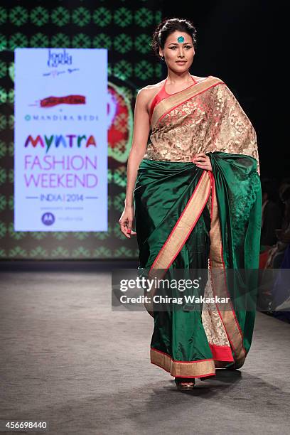 Model showcases designs by Mandira Bedi during day 3 of Myntra Fashion Weekend 2014 at The Palladium Hotel on October 5, 2014 in Mumbai, India