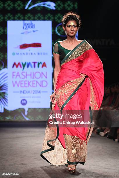 Model showcases designs by Mandira Bedi during day 3 of Myntra Fashion Weekend 2014 at The Palladium Hotel on October 5, 2014 in Mumbai, India