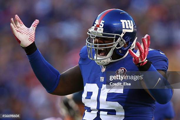 Defensive tackle Johnathan Hankins of the New York Giants celebrates after sacking quarterback Matt Ryan of the Atlanta Falcons in the fourth quarter...