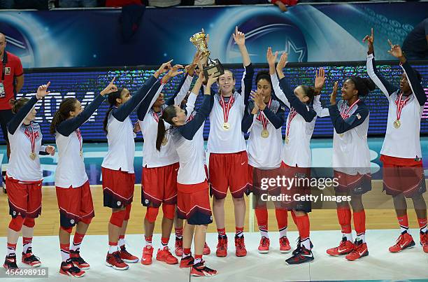 Holds up the trophy after winning their 2014 FIBA Women's World Championships at the final basketball match between Spain and USA at Fenerbahce Ulker...