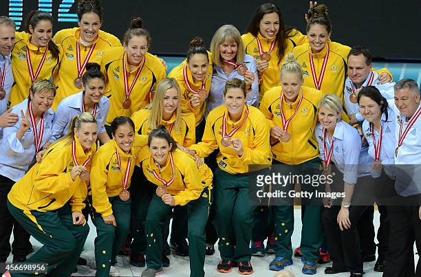 Australian team pose after they win the 3rd place in the 2014 FIBA Women's World Championships at the final basketball match between Spain and USA at...