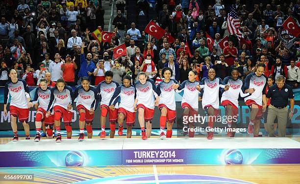 Holds up the trophy after winning their 2014 FIBA Women's World Championships at the final basketball match between Spain and USA at Fenerbahce Ulker...