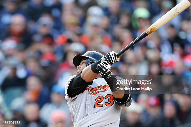 Nelson Cruz of the Baltimore Orioles hits a home run in the sixth inning against the Detroit Tigers during Game Three of the American League Division...