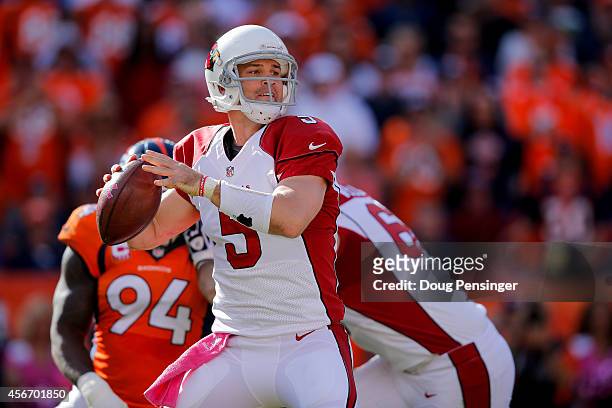 Quarterback Drew Stanton of the Arizona Cardinals passes against the Denver Broncos during a game at Sports Authority Field at Mile High on October...