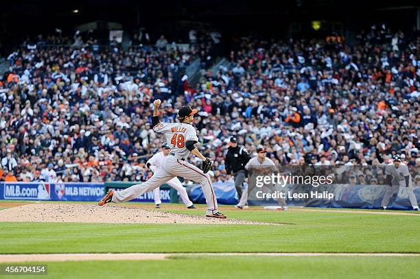 Andrew Miller of the Baltimore Orioles pitches in the seventh inning against the Detroit Tigers during Game Three of the American League Division...