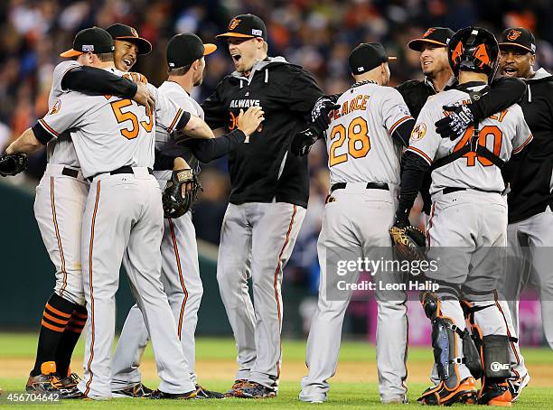 The Baltimore Orioles celebrate their 2 to 1 win over the Detroit Tigers to sweep the series in Game Three of the American League Division Series at...