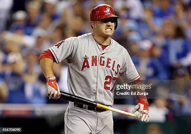 Mike Trout of the Los Angeles Angels reacts after batting against the Kansas City Royals in the third inning during Game Three of the American League...