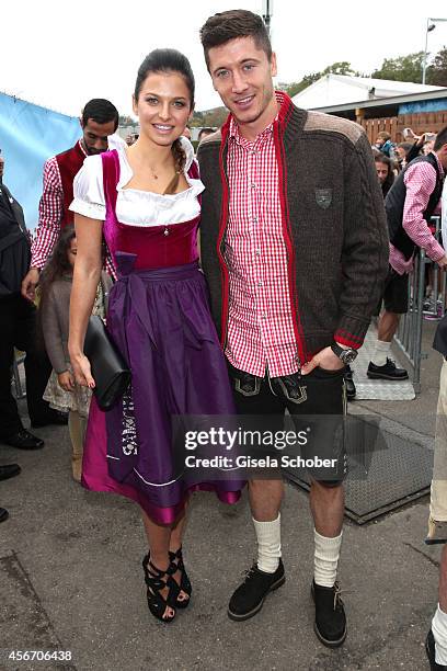 Robert Lewandowski and his wife Anna Stachurska attend the FC Bayern Wies'n during Oktoberfest at Kaeferzetl/Theresienwiese on October 5, 2014 in...