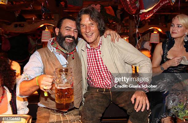 Artist Mauro Bergonzoli, Hans Wilhelm Mueller Wohlfahrt during Oktoberfest at Kaeferzetl/Theresienwiese on October 5, 2014 in Munich, Germany.