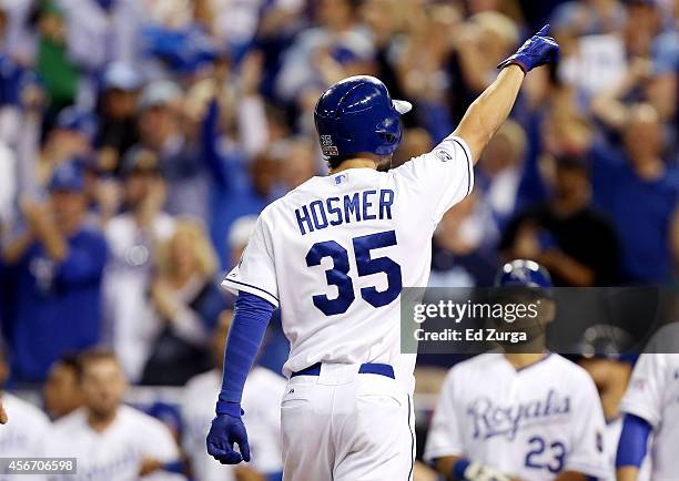 Eric Hosmer of the Kansas City Royals celebrates after hitting a home run in the third inning against the Los Angeles Angels during Game Three of the...