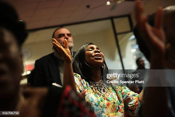 Members of the Staten Island Liberian community and other residents attend a "War Against Ebola" fundraiser and concert at the Christ Assembly...