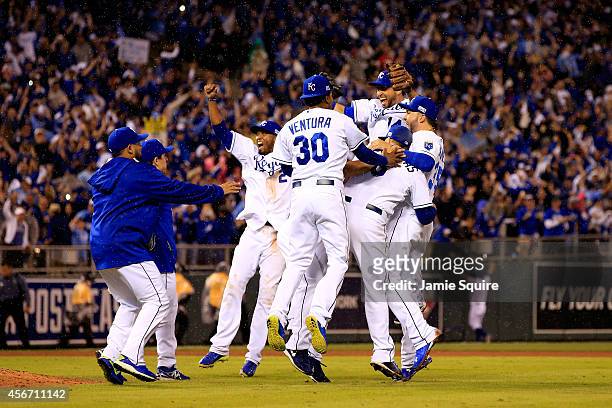 The Kansas City Royals celebrate after defeating the Los Angeles Angels 8-3 to sweep the series in Game Three of the American League Division Series...