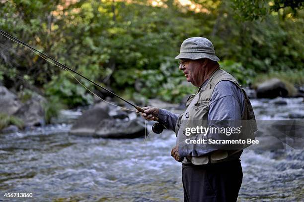 Jerry Rainock of Redding, Calif., fishes for trout on Monday, Sept. 8 in Dunsmuir, Calif. Dunsmuir is a destination for fishermen who seek what...