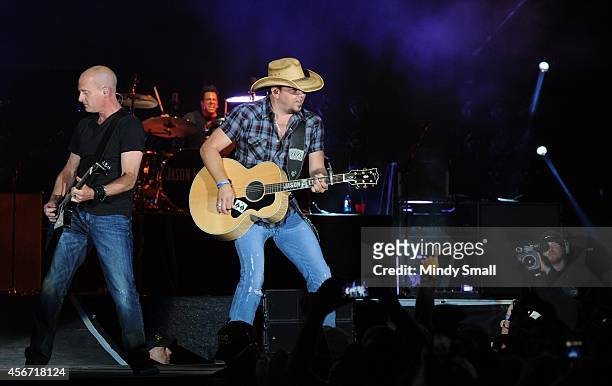 Jack Sizemore, Rich Redmond and Jason Aldean perform during the Route 91 Harvest country music festival at the MGM Resorts Village on October 5, 2014...