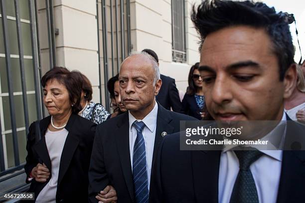 Shrien Dewani's mother Snila Dewani , father Prakash Dewani and brother Preyen Dewani arrive at the Western Cape High Court for the start of their...