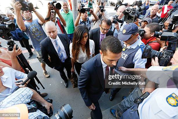 Anni Dewani's father Mr Vinod Hindocha , cousin Sneha Hindocha and brother Anish Hindocha arrive at the Western Cape High Court for the start of the...