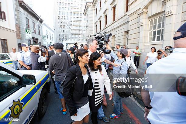 Anni Dewani's sister Ami Denborg and mother Nilam Hindocha arrive at the Western Cape High Court for the start of the trial of Shrien Dewani, on...