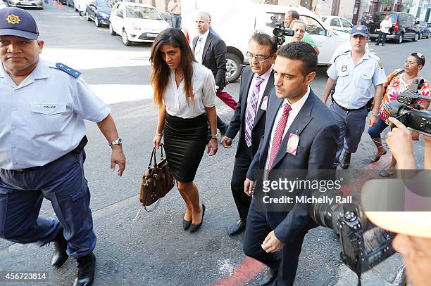 Anni Dewani's father Mr Vinod Hindocha , cousin Sneha Hindocha and brother Anish Hindocha arrive at the Western Cape High Court for the start of the...