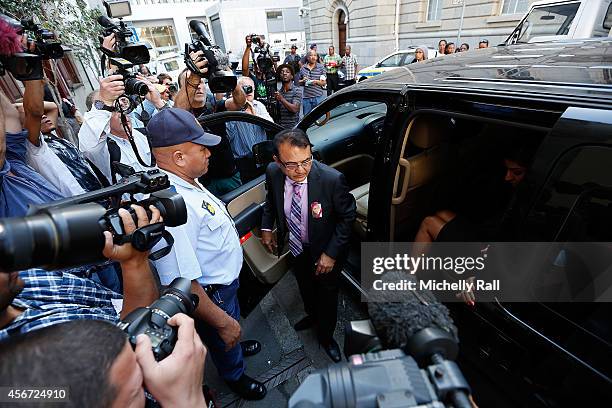 Anni Dewani's father Mr Vinod Hindocha arrives at the Western Cape High Court for the start of the trial of Shrien Dewani, on October 6, 2014 in Cape...