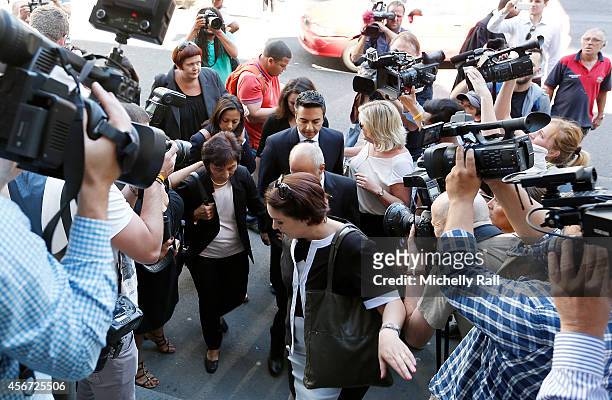 Preyen Dewani and Snila Dewan arrive at the Western Cape High Court for the start of the trial of Shrien Dewani, on October 6, 2014 in Cape Town,...