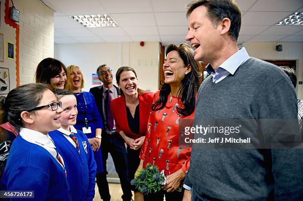 Deputy Prime Minister Nick Clegg, his wife Miriam Gonzalez Durantez and Jo Swinson MP visit Castlehill Primary School on October 6, 2014 in Glasgow,...