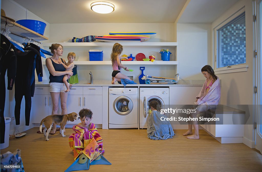 After the beach, family scattered in laundry room