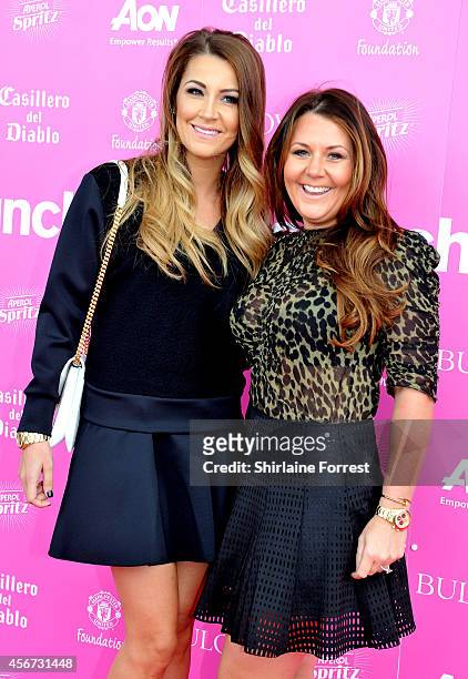 Hayley Fletcher and Nicky Pike attend the Manchester United Foundation Ladies Lunch at Old Trafford on October 6, 2014 in Manchester, England.