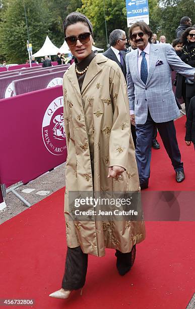 Former Emir of Qatar Sheikh Hamad ben Khalifa al-Thani and his wife Sheikha Mozah bint Nasser Al Missned attend the Qatar Prix de I'Arc de Triomphe...