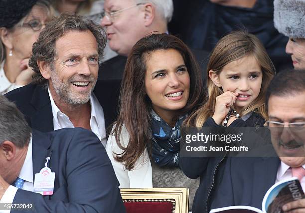 Stephane Freiss, his wife Ursula Freiss and their daughter Bianca Freiss attend the Qatar Prix de I'Arc de Triomphe at Longchamp racecourse on...
