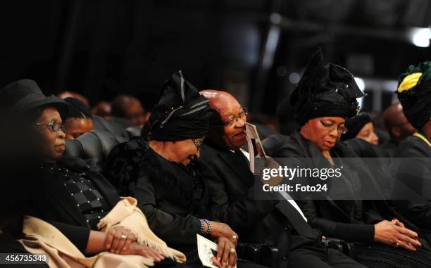 Winnie Madikizela Mandela with President Jacob Zuma during Madiba's State Funeral on December 15, 2013 in Qunu, South Africa. Nelson Mandela passed...
