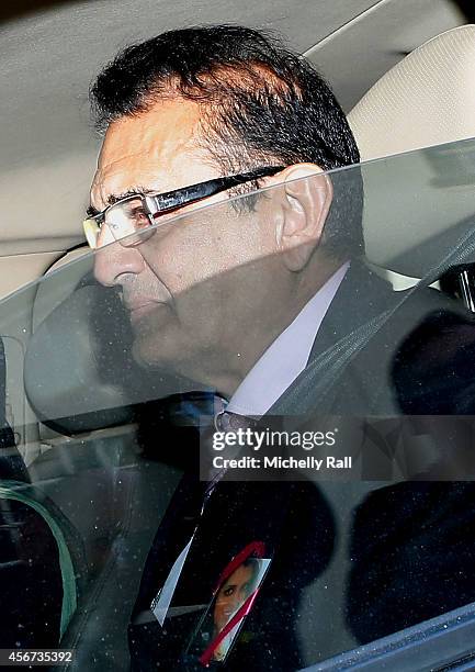 Anni Dewani's father Mr Vinod Hindocha leaves Western Cape High Court during the start of the trial of Shrien Dewani, on October 6, 2014 in Cape...